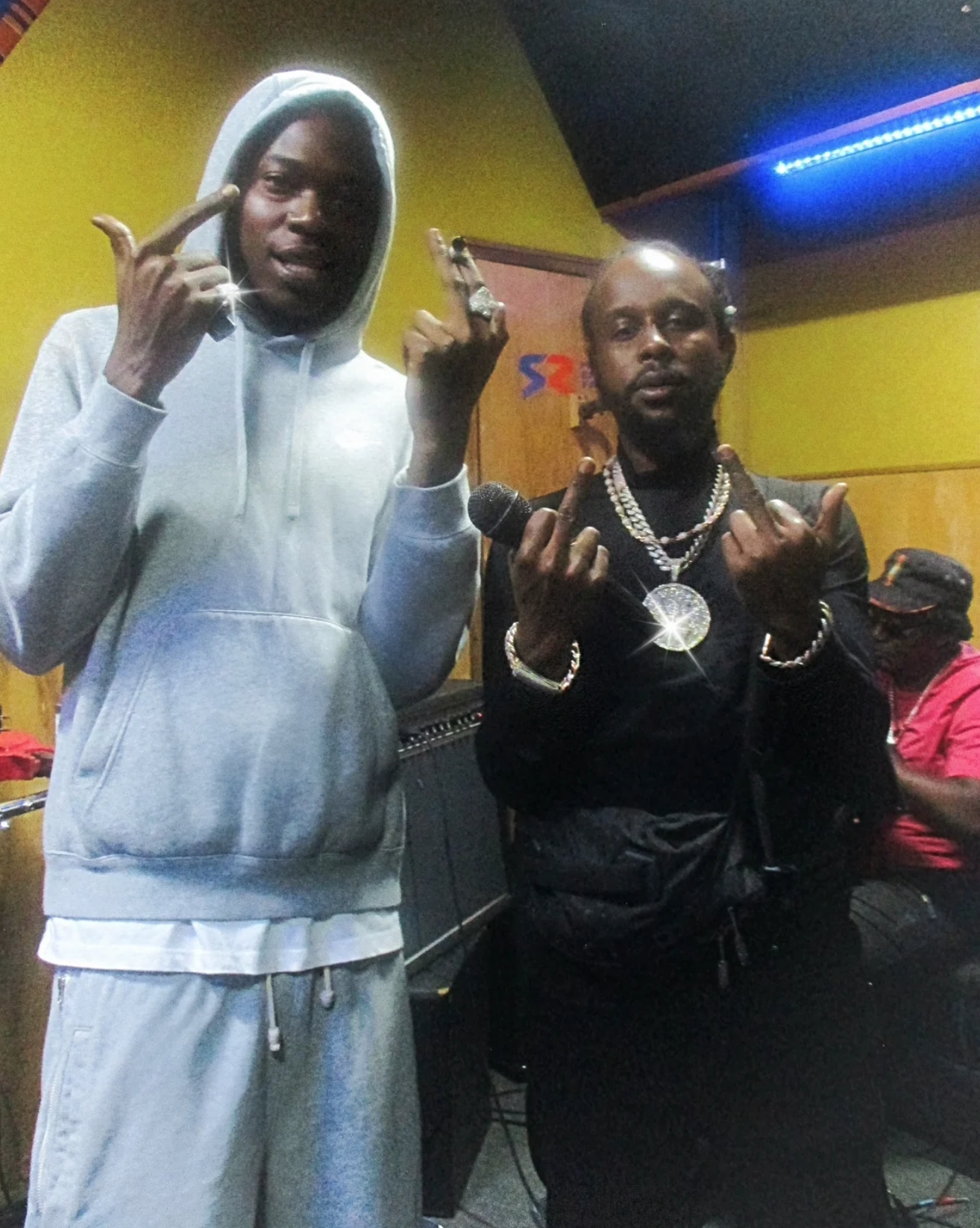 Skilli-Beng-Poses In-studio-with-Popcaan