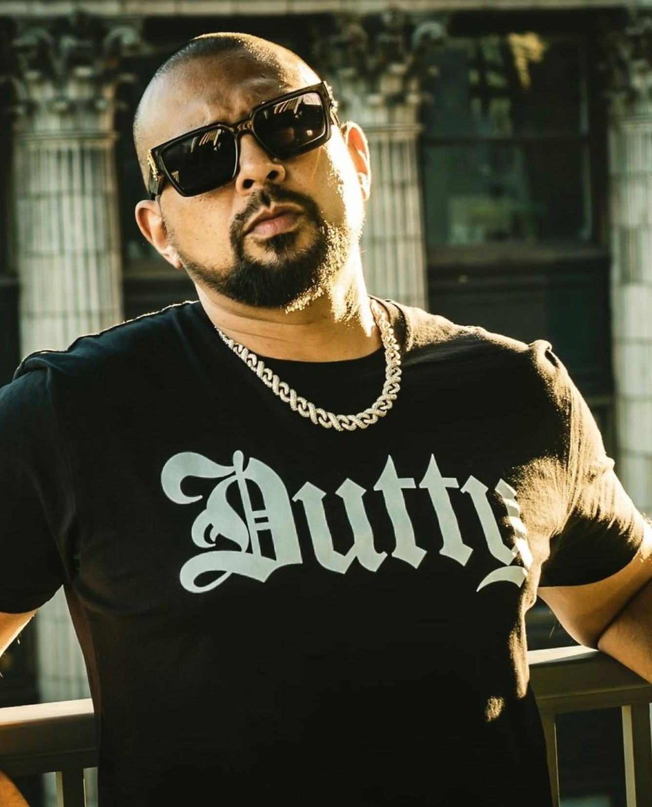 Sean Paul poses in his new dutty merch